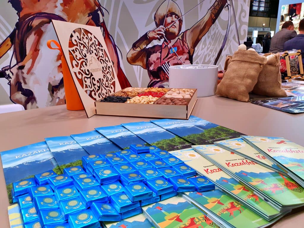 Info Shymkent - Kazakh Chocolate and flyers at Kazakhstans booth at ITB 2024